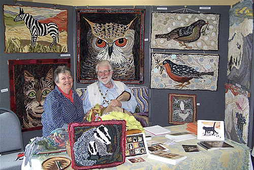 Lewis and Louisa surrounded by their rugs at Sutton Bank